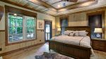 ENTER MASTER KING SUITE w/ WOODLANDS VIEW & BACK DECK PRIVATE ACCESS